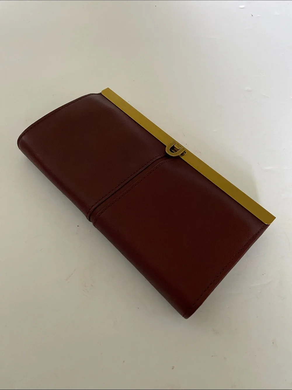 Fossil Burgundy Red Brown Sleek Leather Clutch Wallet with Gold Accent NEW